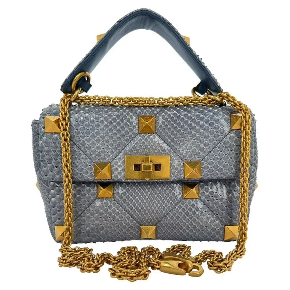 Valentino Garavani Roman Stud Top Handle Bag in Light Blue Leather